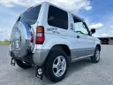 Цей Mitsubishi Pajero Mini — заводська версія JDM Snoopy Edition